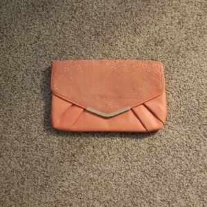 Call it Spring peach purse with polkadot lining